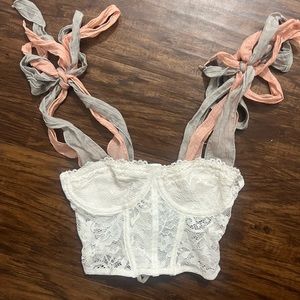 White lace corset inspired top with adjustable tie shoulders